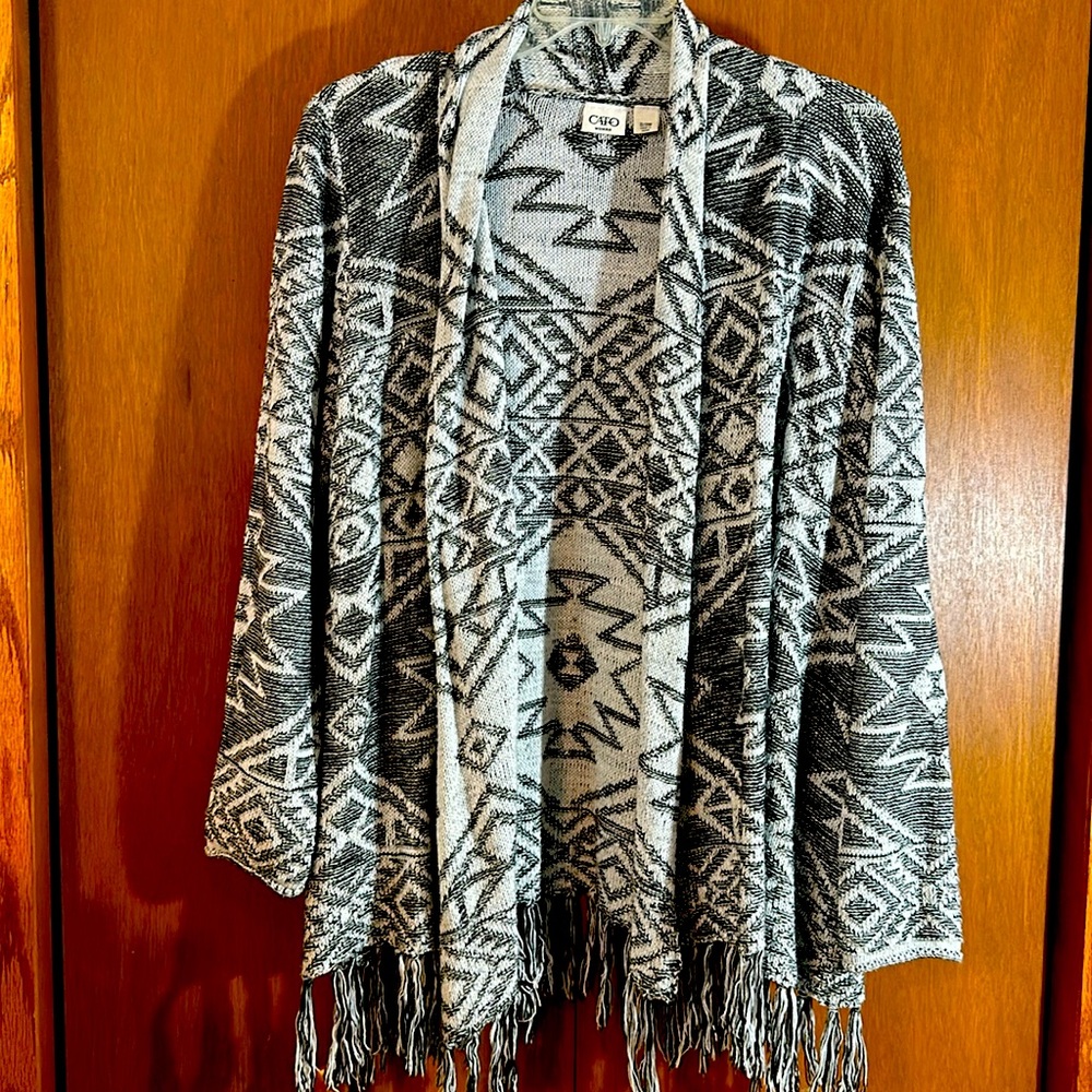 Cato Woman 22/24W Aztec sweater. Long loose sleeves. Tassles on bottom.